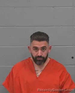Mugshot of MAHMOUD GHASAN AWAD booked in Pasco County, Florida on May 12, 2026
