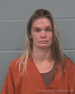 Mugshot of ASHLEY MARIE CONRAD booked in Pasco County, Florida on May 13, 2026