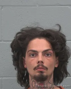 Mugshot of Justin Nicholas Amos booked in Pasco County, Florida on August 18, 2026