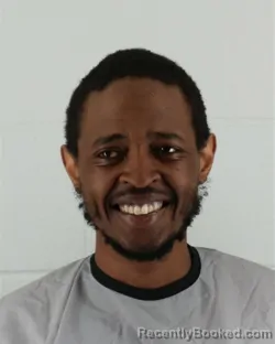 Mugshot of JOSEPH KIMANI