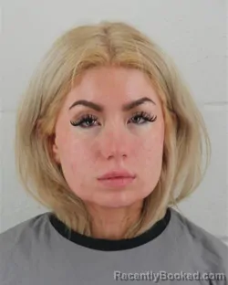 Mugshot of TENNISEN MEGAN FINNIGAN booked in Johnson County, Kansas on March 7, 2026