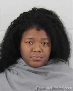 Mugshot of TAMIA LASHAY PERKINS booked in Johnson County, Kansas on March 8, 2026