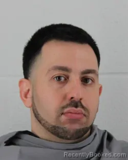 Mugshot of DANIEL ANTHONY DEMIRJIAN booked in Johnson County, Kansas on March 9, 2026