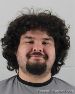 Mugshot of DANIEL CHRISTAIN GILKEY booked in Johnson County, Kansas on March 9, 2026