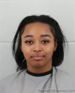 Mugshot of STEMONE LASHAE JOHNSON booked in Johnson County, Kansas on March 10, 2026