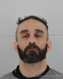 Mugshot of CHARLES SCOTT RINEHART booked in Johnson County, Kansas on March 10, 2026