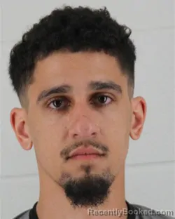 Mugshot of ZSAIMIR JOSEPH HUGHES booked in Johnson County, Kansas on March 10, 2026