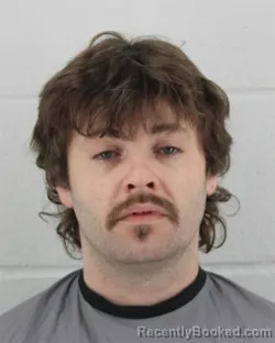 Mugshot of TYLER DEAN BREWER booked in Johnson County, Kansas on March 11, 2026