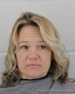 Mugshot of MICHELLE RENEE WOOD booked in Johnson County, Kansas on March 11, 2026