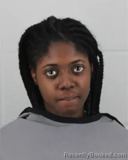 Mugshot of KIRA LANAE CYRELL PLEDGER booked in Johnson County, Kansas on March 12, 2026