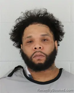 Mugshot of ALONZO HENDERSON JR booked in Johnson County, Kansas on March 12, 2026