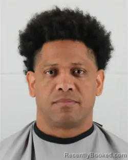 Mugshot of MIGUEL ALFREDO CABALLERO-BAEZ booked in Johnson County, Kansas on March 12, 2026