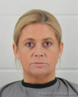 Mugshot of KELLY MARIE TITUS booked in Johnson County, Kansas on March 12, 2026