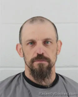 Mugshot of KYLE JAMES GREENLEE booked in Johnson County, Kansas on March 12, 2026