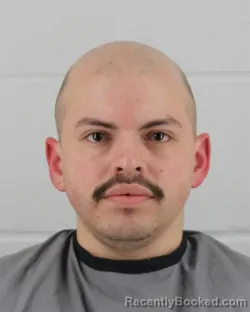 Mugshot of CARLOS DAVID RIVAS booked in Johnson County, Kansas on March 12, 2026