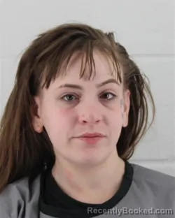 Mugshot of ALLISON TAYLOR BEHLER booked in Johnson County, Kansas on March 13, 2026