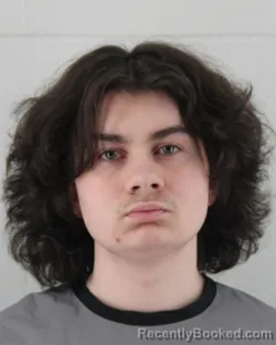 Mugshot of NICHOLAS URIJAH ROSALY booked in Johnson County, Kansas on March 13, 2026