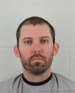 Mugshot of CAMRON JAMES BAUER booked in Johnson County, Kansas on March 13, 2026