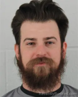 Mugshot of SPENCER DAVID JAMES GREENHALGH booked in Johnson County, Kansas on March 13, 2026