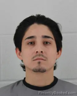 Mugshot of ALAN GLIRADO ACOSTA-PEREZ booked in Johnson County, Kansas on March 13, 2026