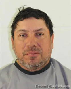 Mugshot of ALFREDO BUSTAMANTE-PINEDA booked in Johnson County, Kansas on March 14, 2026