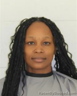 Mugshot of MICAIAH LATREACE DICKENS booked in Johnson County, Kansas on March 14, 2026