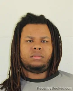 Mugshot of THOMAS ELROY ROBINSON booked in Johnson County, Kansas on March 14, 2026