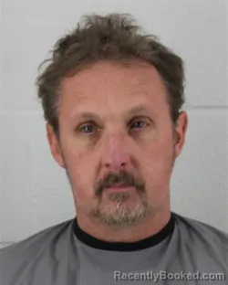 Mugshot of ZEUS XAVIER RADCLIFF booked in Johnson County, Kansas on March 14, 2026