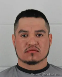 Mugshot of MARIO REYES-GUTIERREZ booked in Johnson County, Kansas on March 14, 2026