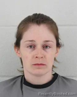 Mugshot of KELISSA DAWN MONROY booked in Johnson County, Kansas on March 14, 2026