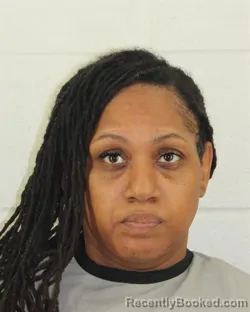 Mugshot of TIFFANY NICOLE POWELL booked in Johnson County, Kansas on March 16, 2026