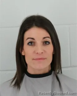 Mugshot of AMANDA CLARE SCOTT booked in Johnson County, Kansas on March 16, 2026