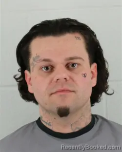 Mugshot of TYLER JESSIE DAVID REDMOND booked in Johnson County, Kansas on March 16, 2026