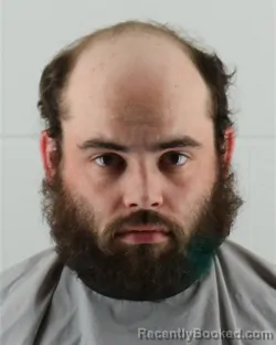 Mugshot of CHRISTIAN MICHAEL COOPER DEGRAEVE booked in Johnson County, Kansas on March 18, 2026