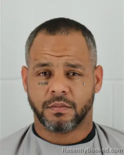 Mugshot of RICHARD ALLEN ETIM booked in Johnson County, Kansas on March 18, 2026