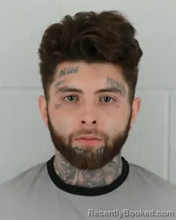 Mugshot of RENE ORTIZ booked in Johnson County, Kansas on March 19, 2026