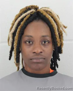 Mugshot of NAQUIA SHANELL RAGSDALE booked in Johnson County, Kansas on March 19, 2026