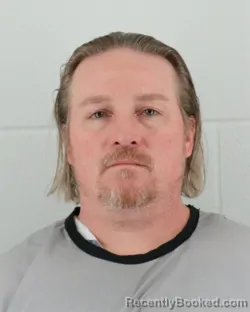 Mugshot of KALEB A KENSMOE booked in Johnson County, Kansas on March 20, 2026