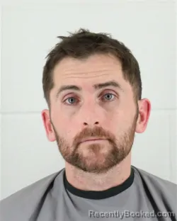 Mugshot of JON STEWART BASS booked in Johnson County, Kansas on March 20, 2026