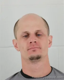 Mugshot of SION PATRICK KAVANAUGH booked in Johnson County, Kansas on March 21, 2026