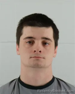 Mugshot of DYLAN MICHAEL LANG booked in Johnson County, Kansas on March 22, 2026