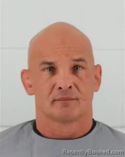 Mugshot of GRANT DAVID HARTWIG booked in Johnson County, Kansas on March 22, 2026