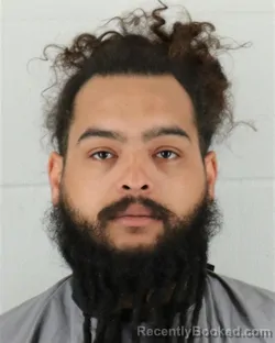 Mugshot of AUGUST JEFFERY WIGGINS booked in Johnson County, Kansas on March 22, 2026