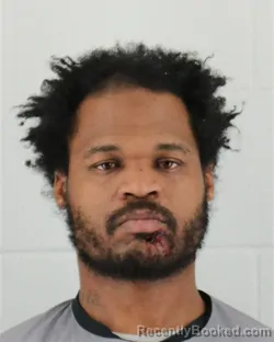 Mugshot of CHRISTOPHER CORTEZ WILKES booked in Johnson County, Kansas on March 23, 2026