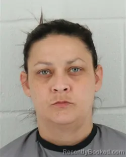 Mugshot of KRISSY CHRISTINA RENEE JANS booked in Johnson County, Kansas on March 23, 2026