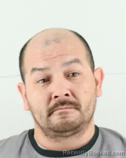 Mugshot of CHRISTOPHER LEAL SALAZAR booked in Johnson County, Kansas on March 24, 2026