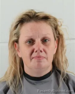 Mugshot of TINA MARIE MOORE booked in Johnson County, Kansas on March 24, 2026