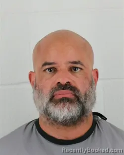 Mugshot of BENJAMIN EARL BURTON booked in Johnson County, Kansas on March 24, 2026