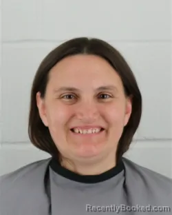 Mugshot of HEATHER AMADA WEEKS booked in Johnson County, Kansas on March 25, 2026