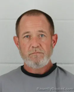 Mugshot of THOMAS ALBERT DEVANY booked in Johnson County, Kansas on March 25, 2026